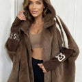 Veste Ample à Capuche Femme