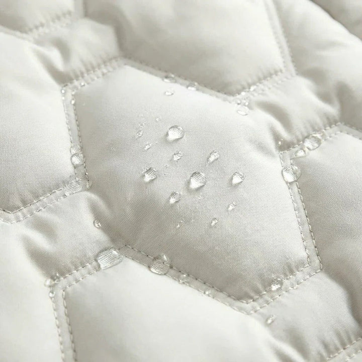 Doudoune Longue à Capuche Matelassée Femme